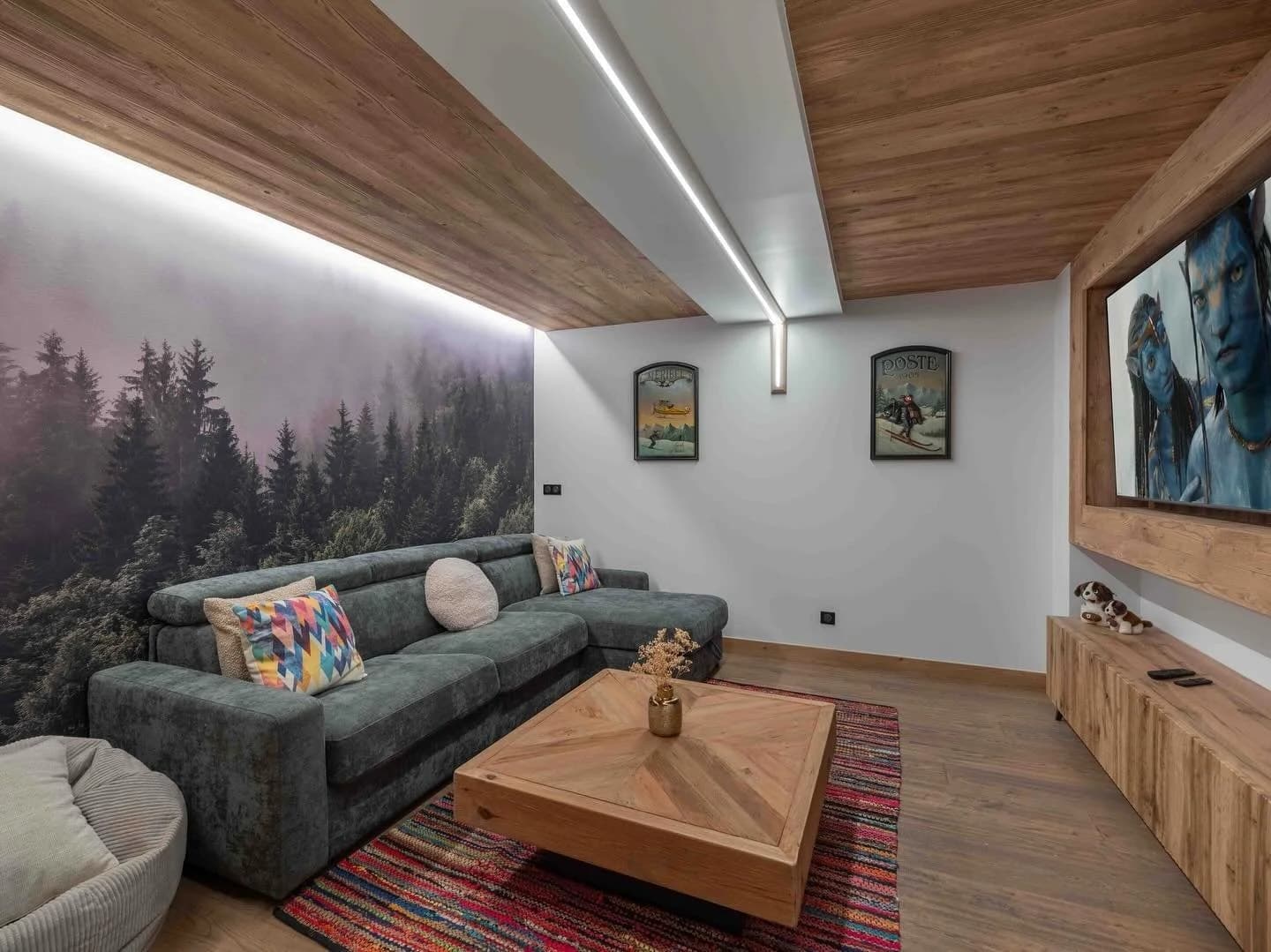 Instagram post: cinema room with a forest mural (opens in a new tab)